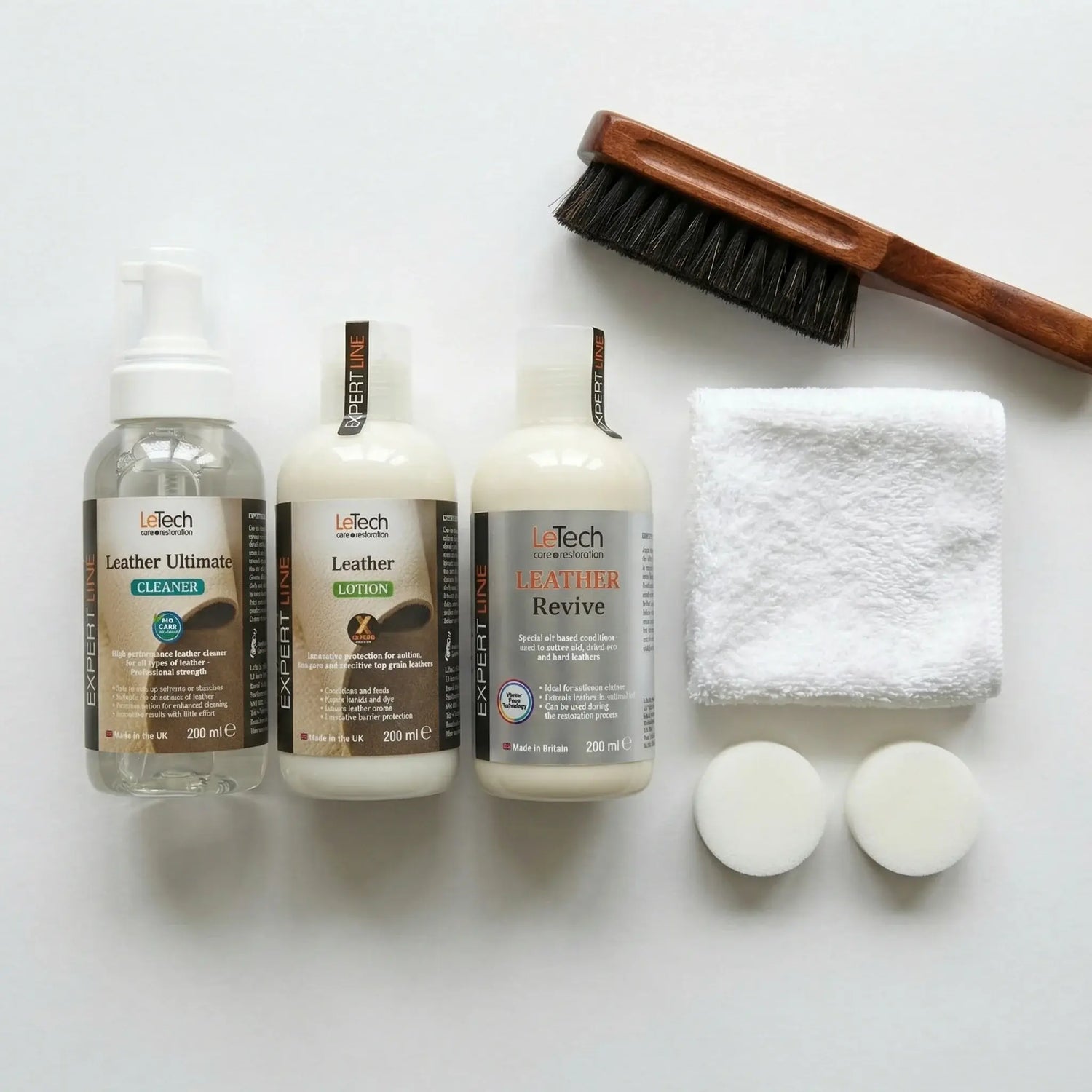 LeTech Leather care products including cleaner, lotion, revive, brush, towel, and applicators on a white background.